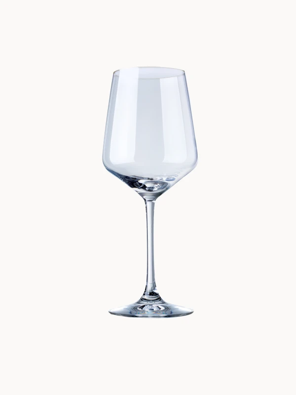 A single clear wine glass with a long stem, isolated on a light background.