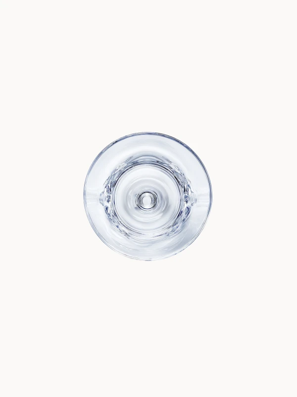A top-down photograph looking directly into the clear crystal base, on a light background.